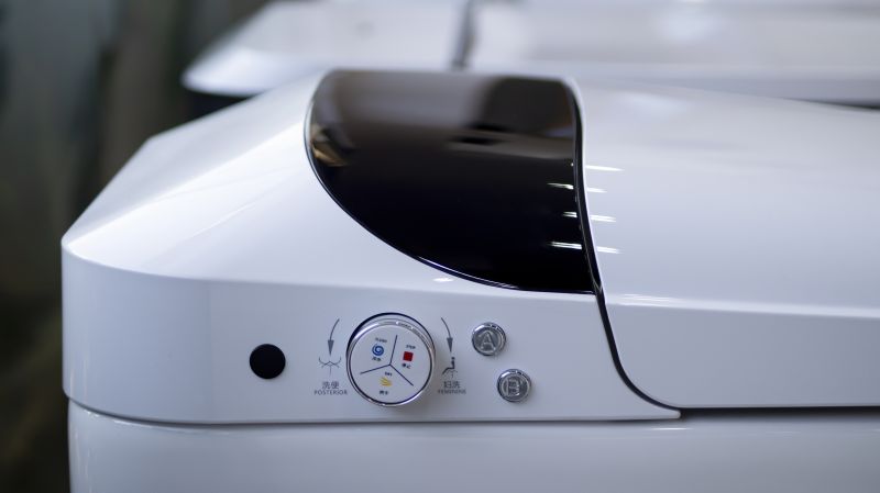 automatic toilet lid