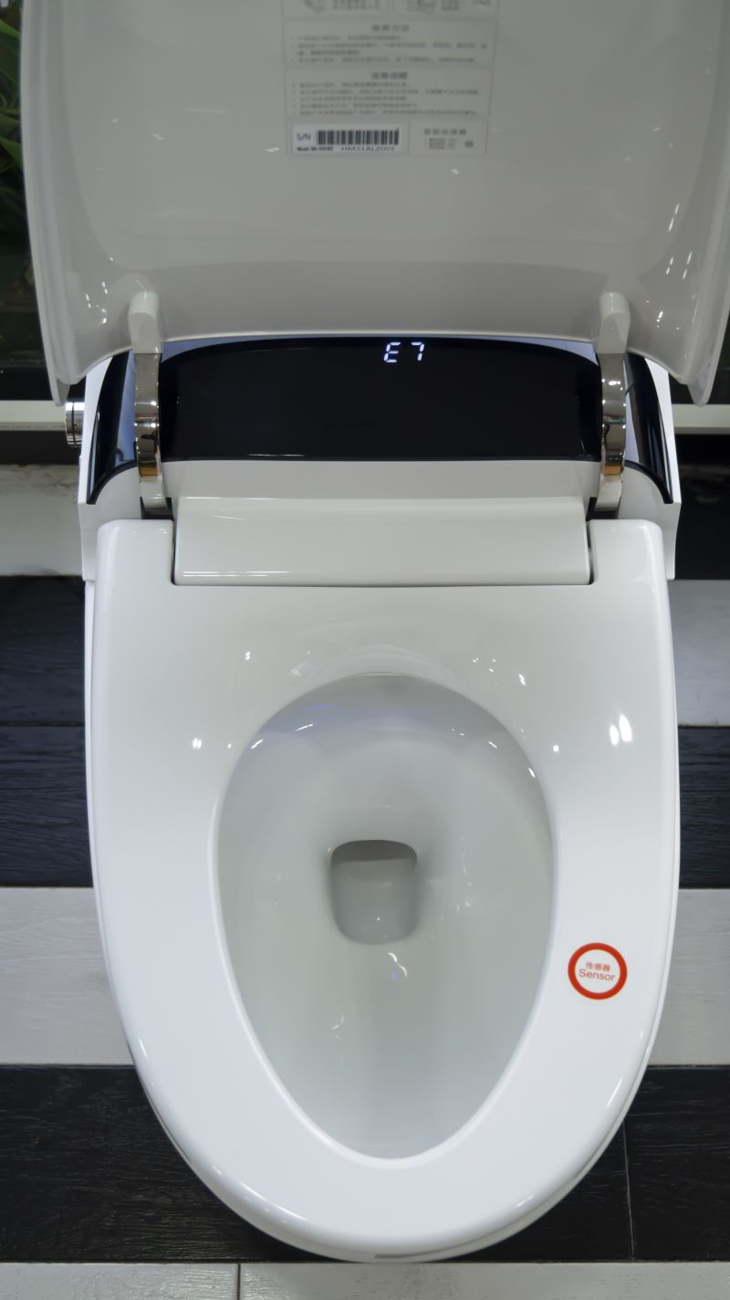 automatic toilet lid